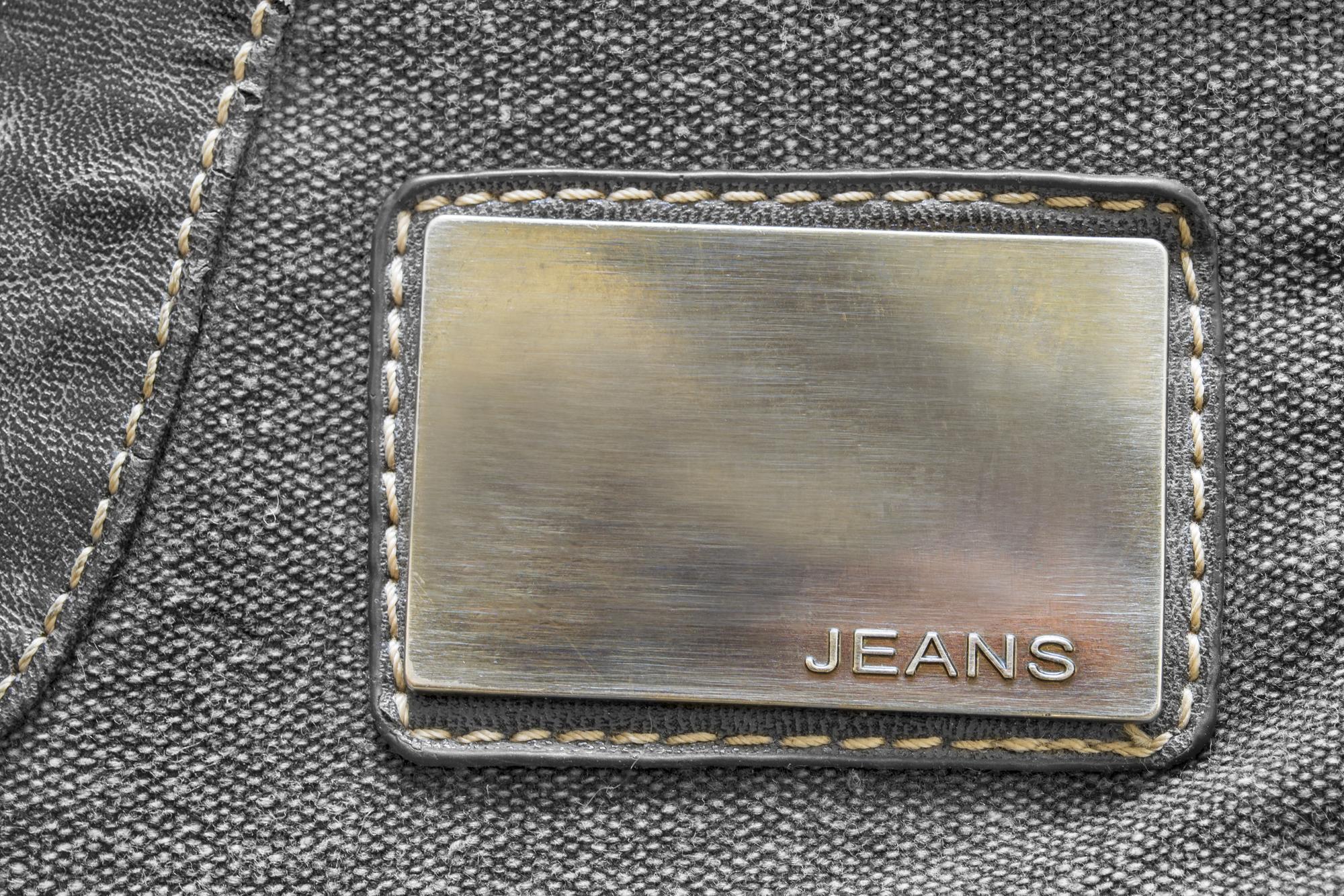Embroidered patch with metallic thread on denim